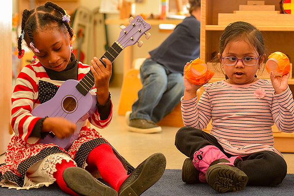 Children playing with musical instruments